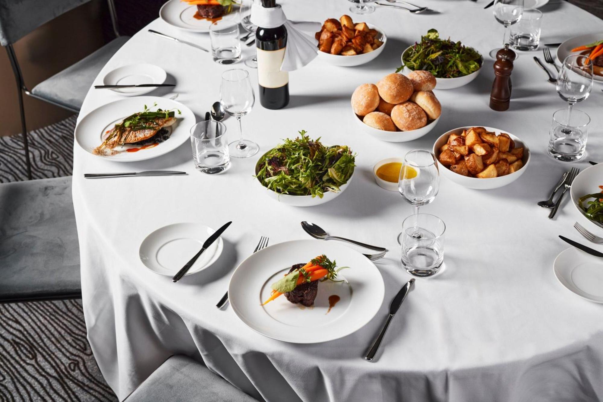 Melbourne Marriott Hotel Docklands Екстериор снимка A table set for a formal dinner